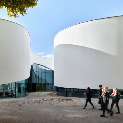 Dominique Coulon & Associés gives library undulating walls like an “unfurling ribbon”