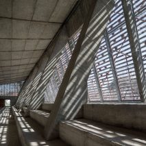 Beta Ø Architects upgrades Madrid riding arena with slatted wooden exterior