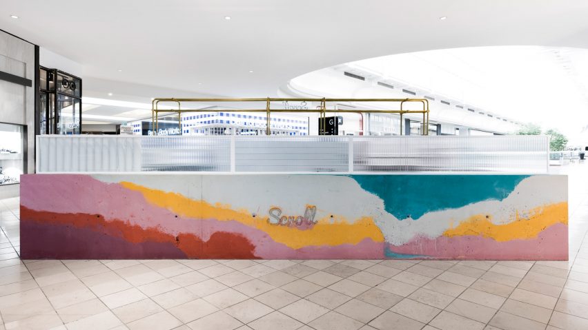 Multicoloured concrete bar creates ice cream stand inside Melbourne shopping centre