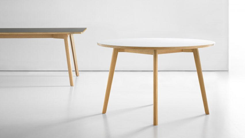 Solem table keeps cables tidy with hidden storage in each leg