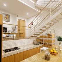 Multiple mezzanines are connected by an open stair in Delution Architect’s Jakarta house