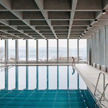 Illiz Architektur sets children’s swimming pool above former underground troop billet in Zurich