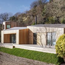 AR Design Studio replaces landslide-damaged holiday home with cluster of larch-clad blocks