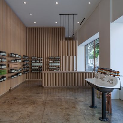 Brooks + Scarpa recycles cardboard tubes and paper for Los Angeles Aesop store interior