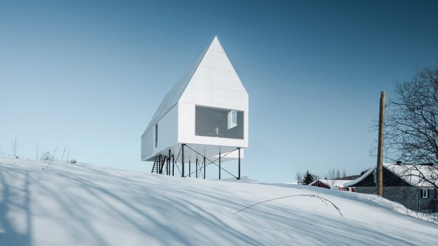 Delordinaire raises High House above snowy Quebec countryside to protect an outdoor lounge