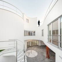 House L27 by dIONISO LAB is arranged around a curving courtyard in northern Portugal