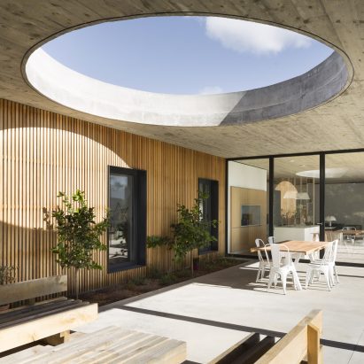 Huge circular skylight punctures terrace canopy in south of France house