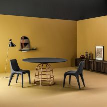 Alain Gilles’ Mass tables rest on wireframe-style metal bases