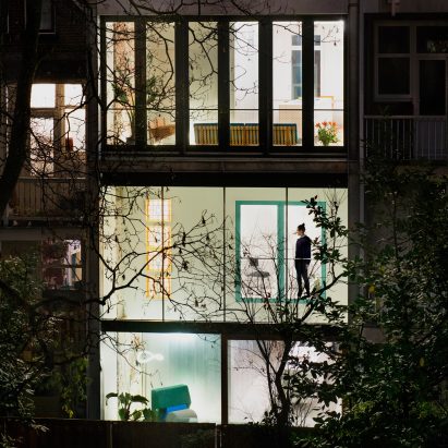 Shift exchanges brickwork for glazing to create bright apartments in Rotterdam townhouse