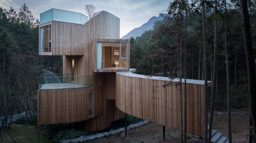 Stacked boxes form Bengo Studio’s towering Tree House hotel in rural China