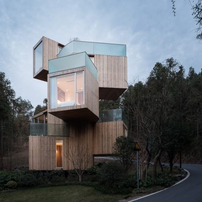 Stacked boxes form Bengo Studio’s towering Tree House hotel in rural China