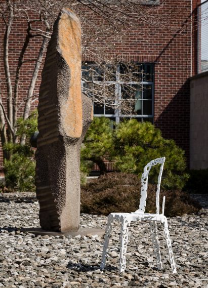 Isamu Noguchi, Behind Inner Seeking Shiva Dancing; Robert Stadler, Rest in Peace #2 (chair), courtesy of the artist