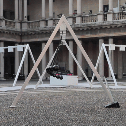 Yuri Suzuki installs giant pendulums in courtyard of Milanese seminary