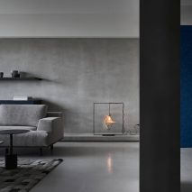 Shades of grey decorate sombre luxury apartment in Taiwan
