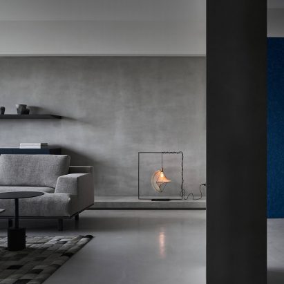 Shades of grey decorate sombre luxury apartment in Taiwan