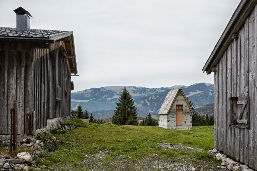 Alpine chapel by IMA, perched along a scenic Austrian meadow