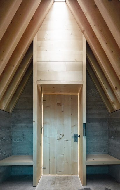 Alpine chapel by IMA, perched along a scenic Austrian meadow