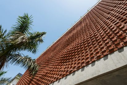 Brick Curtain House by Design Work Group