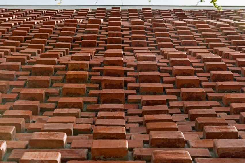 Brick Curtain House by Design Work Group