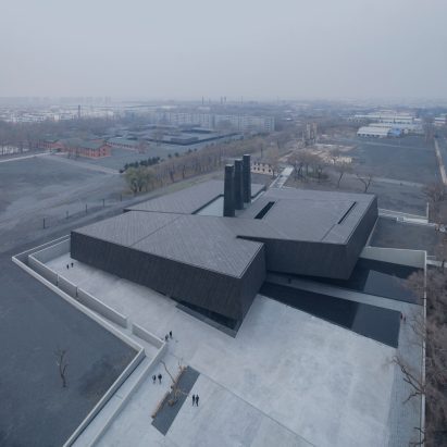 Sloping black volumes penetrate public square at Harbin’s Exhibition Hall of Crime Evidences
