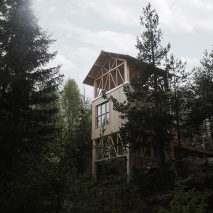 Timber-framed cabin by Hanna Michelson stands on stilts to peep over the treetops of Swedish mountain