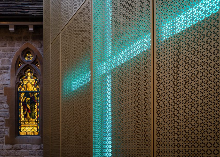 Glowing gold extension added to Winchester university chapel by Design Engine