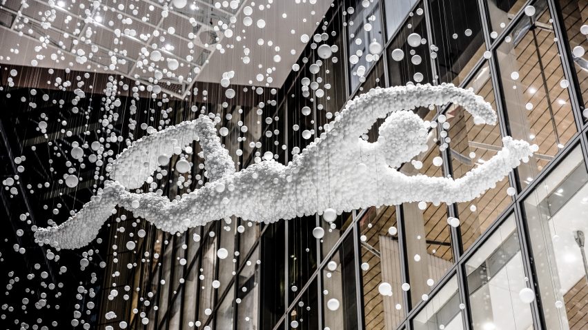 Lasvit uses glass balls to create sculpture in the shape of a South Korean pearl diver