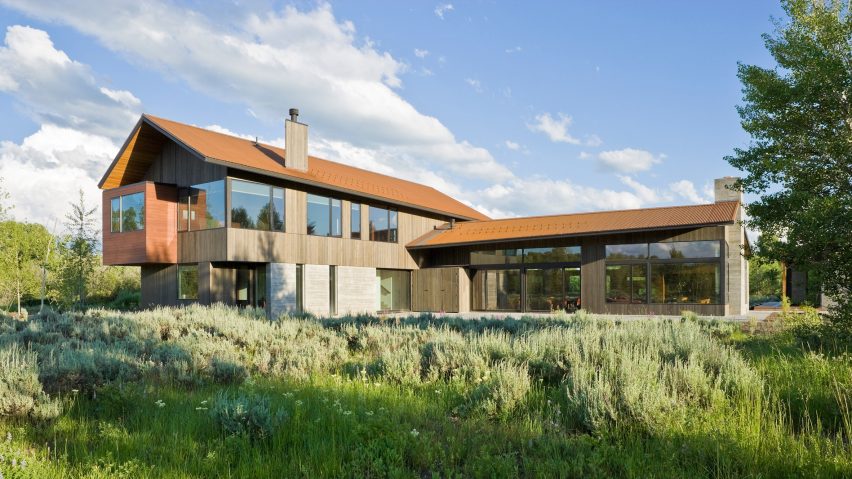 Dynia completes house facing a Wyoming mountain range