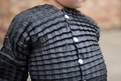 Graduate Ryan Mario Yasin designs clothes that grow with your child, called Petit Pli