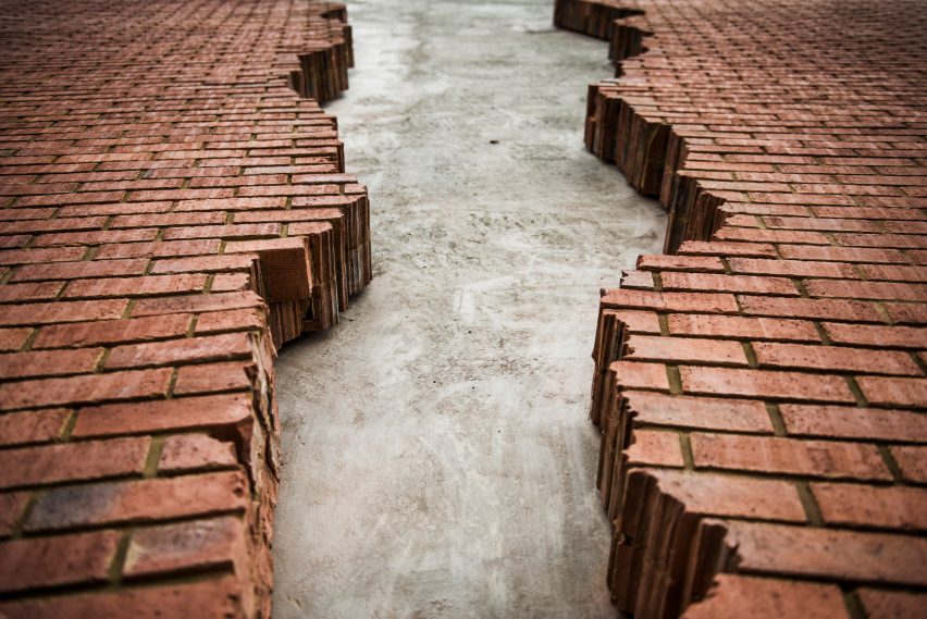 Six Pins and Half a Dozen Needles by Alex Chinneck