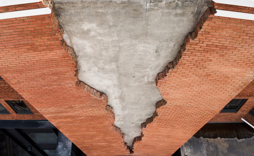 Six Pins and Half a Dozen Needles by Alex Chinneck