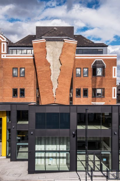 Six Pins and Half a Dozen Needles by Alex Chinneck