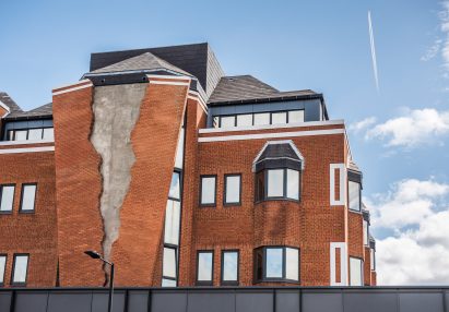 Six Pins and Half a Dozen Needles by Alex Chinneck