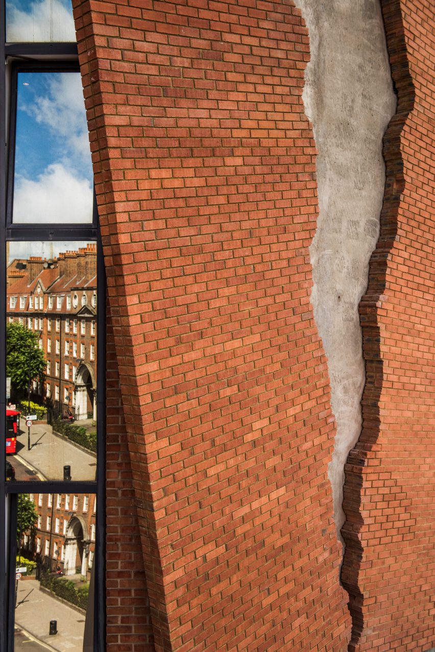 Six Pins and Half a Dozen Needles by Alex Chinneck