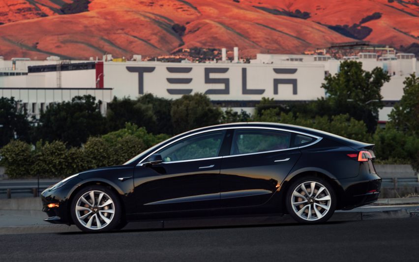 Electric car company Tesla unveils Model 3