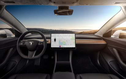 Electric car company Tesla unveils Model 3