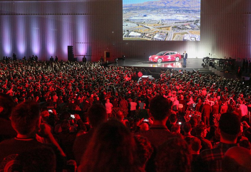 Electric car company Tesla unveils Model 3