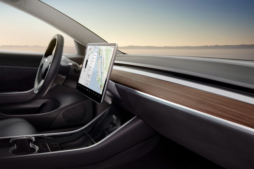 Electric car company Tesla unveils Model 3
