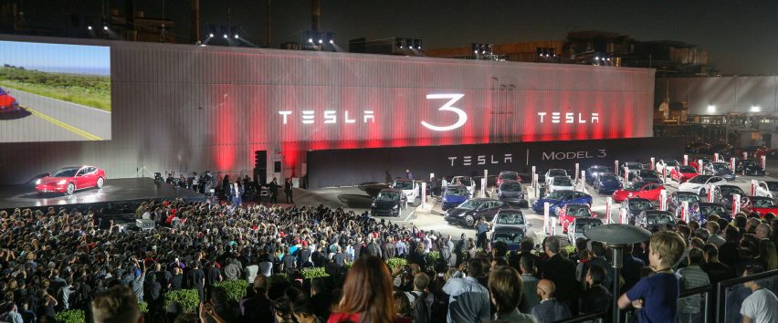 Electric car company Tesla unveils Model 3