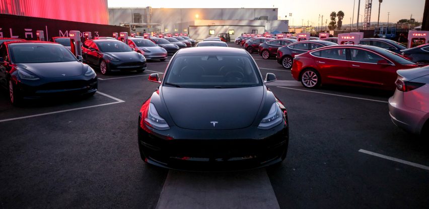 Electric car company Tesla unveils Model 3