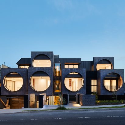 Huge porthole windows bathe Melbourne apartments with natural light