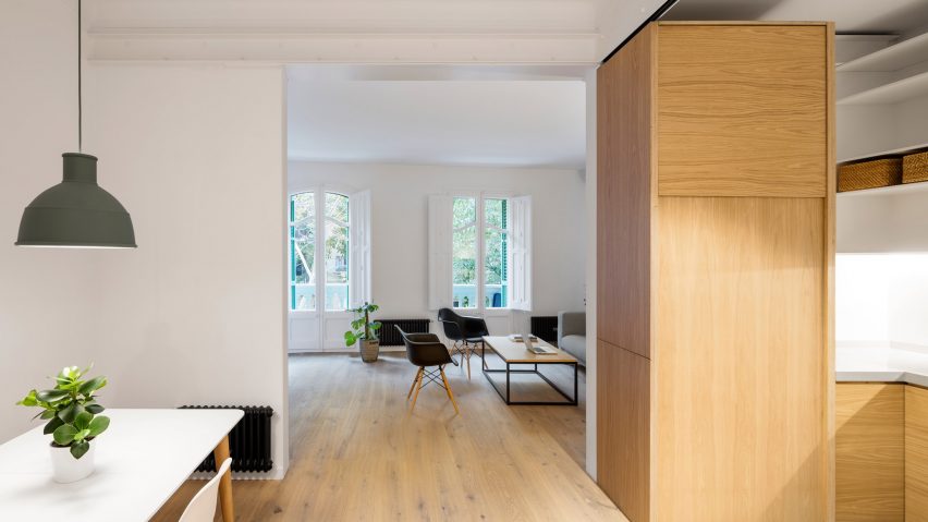 Adrian Elizalde and Clara Ocaña eschew tiles for timber in Barcelona apartment renovation