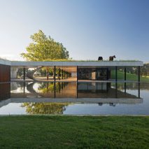 Polo stables by Estudio Ramos features grassy roof for horses to graze