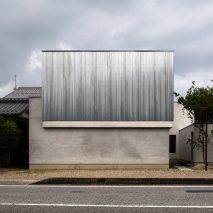 Kouichi Kimura completes steel-wrapped home and studio for photographer in Shiga