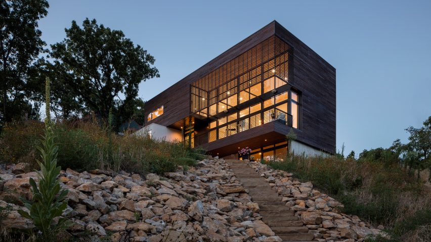 Kem Studio wraps lakeside Missouri residence in cypress and white stucco