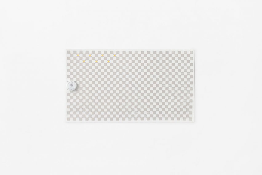 Nendo torch made from a piece of paper