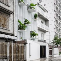 DANstudio adds “green balconies” to facade of Hanoi townhouse