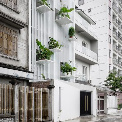 DANstudio adds “green balconies” to facade of Hanoi townhouse