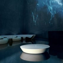 Brodie Neill showcases his “ocean terrazzo” with waterfall installation