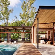 Living spaces open out to Lake Austin at residence by A Parallel